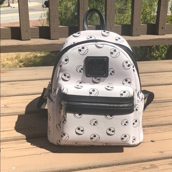 Loungefly Handbags - Loungefly vinyl mini backpack